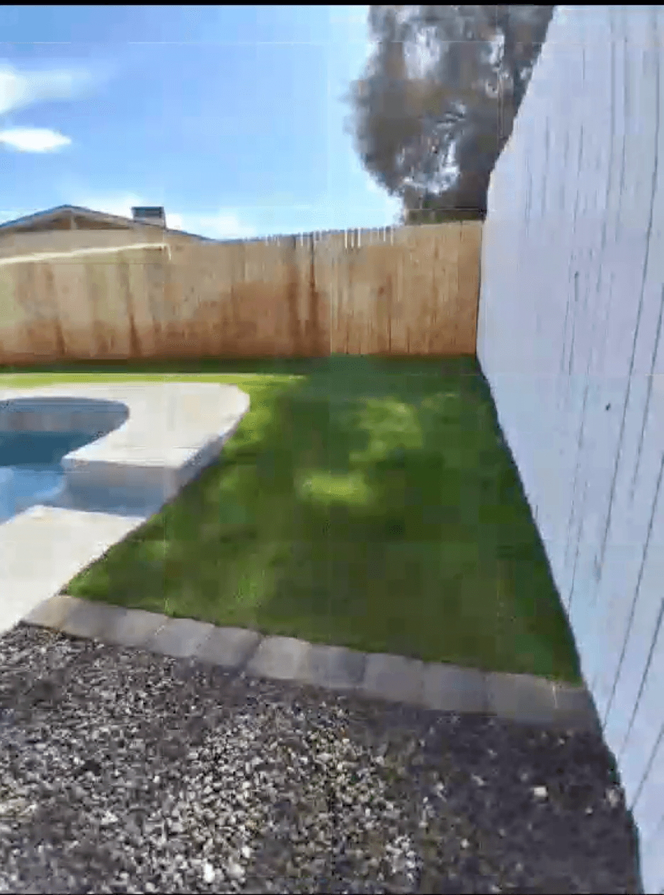 Poolside landscaping with artificial turf